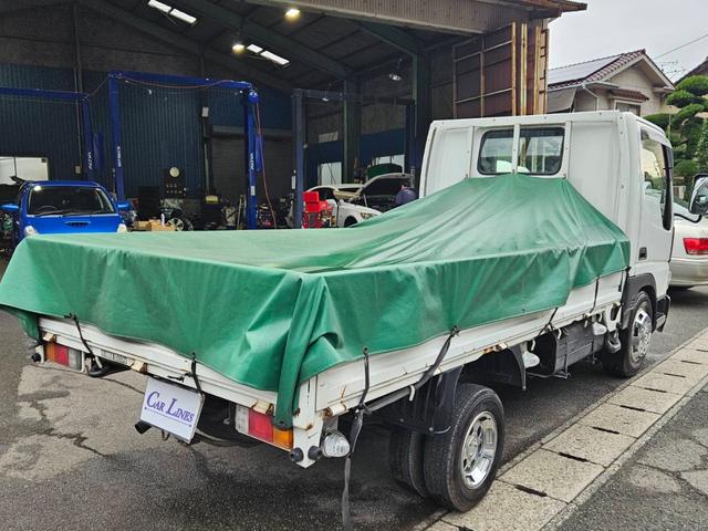 タイタンダッシュ ロングワイドローＤＸ　５速ミッション　メッキバンパー付　３人乗り　外装現状渡し　積載量１５００ｋｇ　ディーゼル車　パワステ　ＰＷ　エアコン　運転席キーレス付　ＥＴＣ　電動ミラー　３方開　ルームクリーニング済　純正バンパー有（11枚目）