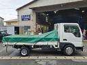 タイタンダッシュ ロングワイドローＤＸ　５速ミッション　メッキバンパー付　３人乗り　外装現状渡し　積載量１５００ｋｇ　ディーゼル車　パワステ　ＰＷ　エアコン　運転席キーレス付　ＥＴＣ　電動ミラー　３方開　ルームクリーニング済　純正バンパー有（7枚目）