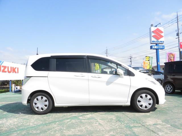 G ジャストセレクション パワースライド ナビ テレビ キーフリー 禁煙車 7人乗り 3列シート ABS 衝突安全ボディ オートエアコン イモビ(4枚目)