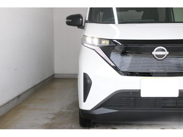 サクラ Ｘ　１２セグ　メーカー保証令和１１年３月まで　純正９型ディスプレイ　全方位カメラ　エマージェンシーブレーキ　フロント＆バックソナー　急速充電　電動パーキングブレーキ　純正１４インチＡＷ　オートエアコン（28枚目）