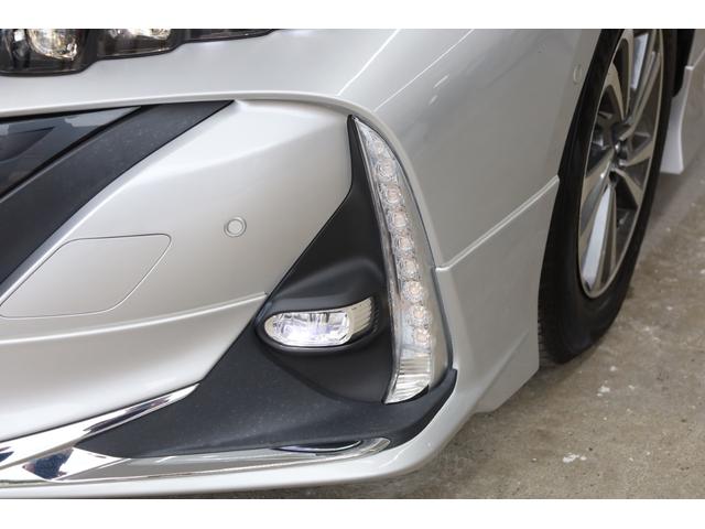 プリウスＰＨＶ Ａ　後期型　５人乗り　寒冷地仕様　モデリスタフルエアロ　改良後セーフティセンス　純正９型ＳＤナビ　全方位カメラ　ＩＣＳ　ＢＳＭ　禁煙車　モデリスタ１５インチＡＷ　ＡＣ１５００Ｗ　置くだけ充電　パワーシート（33枚目）