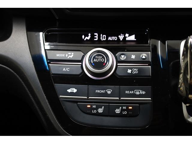 フリードハイブリッド ハイブリッド・ＥＸ　両側電動スライドドア　ホンダセンシング　禁煙車　純正メモリーナビ　アップルカープレイ　バックカメラ　シートヒーター　純正１５インチＡＷ　レーダークルーズ　後席サンシェード　ＬＥＤヘッドライト　ＥＴＣ（9枚目）