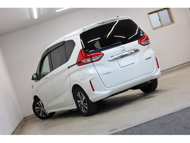 フリードハイブリッド ハイブリッド・ＥＸ　両側電動スライドドア　ホンダセンシング　禁煙車　純正メモリーナビ　アップルカープレイ　バックカメラ　シートヒーター　純正１５インチＡＷ　レーダークルーズ　後席サンシェード　ＬＥＤヘッドライト　ＥＴＣ（11枚目）
