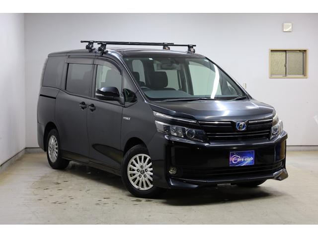 ヴォクシー ハイブリッドＶ　ワンオーナー　アルパイン１０型ＳＤナビ　Ｂカメラ　電動スライドドア　左右独立ＡＡＣ　リヤエアコン　後席サンシェード　シートヒーター　クルーズコントロール　ＥＴＣ　純正１５インチＡＷ　ＬＥＤヘッドライト（2枚目）