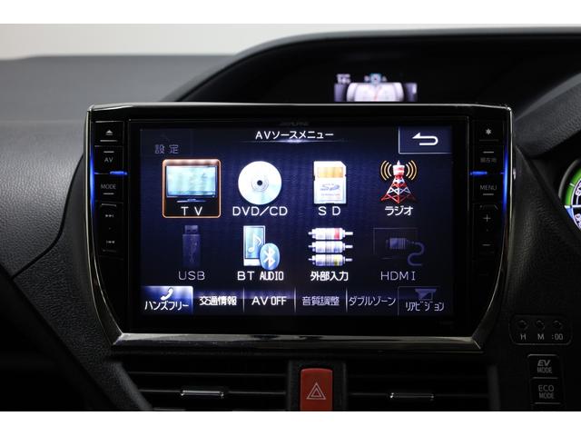 ヴォクシー ハイブリッドＶ　ワンオーナー　アルパイン１０型ＳＤナビ　Ｂカメラ　電動スライドドア　左右独立ＡＡＣ　リヤエアコン　後席サンシェード　シートヒーター　クルーズコントロール　ＥＴＣ　純正１５インチＡＷ　ＬＥＤヘッドライト（5枚目）