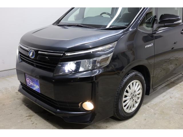 ヴォクシー ハイブリッドＶ　ワンオーナー　アルパイン１０型ＳＤナビ　Ｂカメラ　電動スライドドア　左右独立ＡＡＣ　リヤエアコン　後席サンシェード　シートヒーター　クルーズコントロール　ＥＴＣ　純正１５インチＡＷ　ＬＥＤヘッドライト（13枚目）