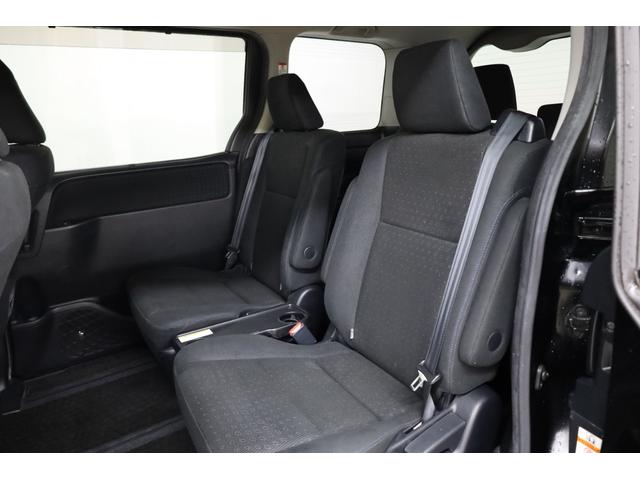 ヴォクシー ハイブリッドＶ　ワンオーナー　アルパイン１０型ＳＤナビ　Ｂカメラ　電動スライドドア　左右独立ＡＡＣ　リヤエアコン　後席サンシェード　シートヒーター　クルーズコントロール　ＥＴＣ　純正１５インチＡＷ　ＬＥＤヘッドライト（17枚目）