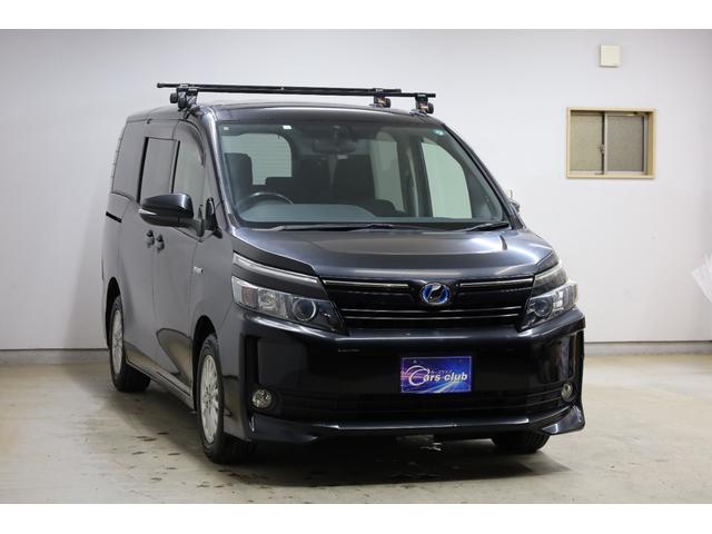 ヴォクシー ハイブリッドＶ　ワンオーナー　アルパイン１０型ＳＤナビ　Ｂカメラ　電動スライドドア　左右独立ＡＡＣ　リヤエアコン　後席サンシェード　シートヒーター　クルーズコントロール　ＥＴＣ　純正１５インチＡＷ　ＬＥＤヘッドライト（21枚目）