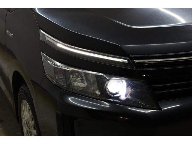 ヴォクシー ハイブリッドＶ　ワンオーナー　アルパイン１０型ＳＤナビ　Ｂカメラ　電動スライドドア　左右独立ＡＡＣ　リヤエアコン　後席サンシェード　シートヒーター　クルーズコントロール　ＥＴＣ　純正１５インチＡＷ　ＬＥＤヘッドライト（30枚目）