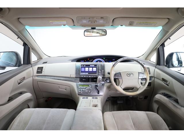 エスティマハイブリッド G 4WD ワンオーナー 両側電動スライドドア 純正8型HDDナビ Bカメラ 禁煙車 ダブルAAC パワーシート シートヒーター 純正17インチAW 脱着式デッキボード AC1500W オットマン ETC(4枚目)