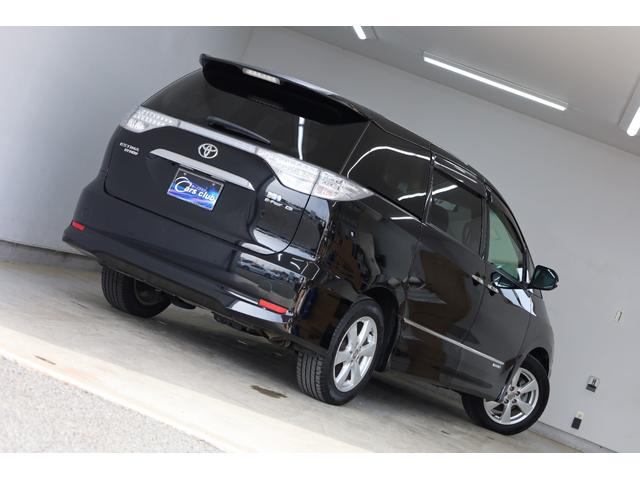 エスティマハイブリッド G 4WD ワンオーナー 両側電動スライドドア 純正8型HDDナビ Bカメラ 禁煙車 ダブルAAC パワーシート シートヒーター 純正17インチAW 脱着式デッキボード AC1500W オットマン ETC(12枚目)