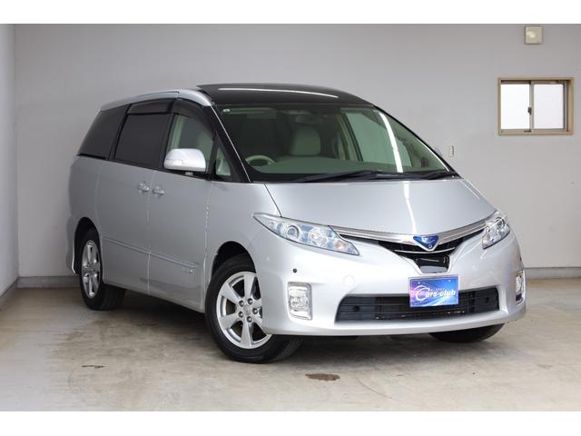 エスティマハイブリッド Gレザーパッケージ 4WD 大型サンルーフ 本革シート 両側電動スライドドア 電動床下格納機能 純正8型ナビ 純正後席モニター 純正17AW 脱着式デッキボード Wエアコン AC1500W オットマン レーダークルーズ(2枚目)