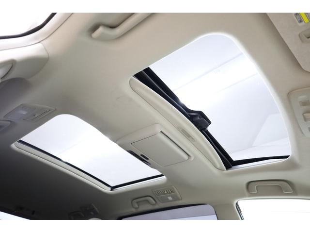 エスティマハイブリッド Gレザーパッケージ 4WD 大型サンルーフ 本革シート 両側電動スライドドア 電動床下格納機能 純正8型ナビ 純正後席モニター 純正17AW 脱着式デッキボード Wエアコン AC1500W オットマン レーダークルーズ(5枚目)