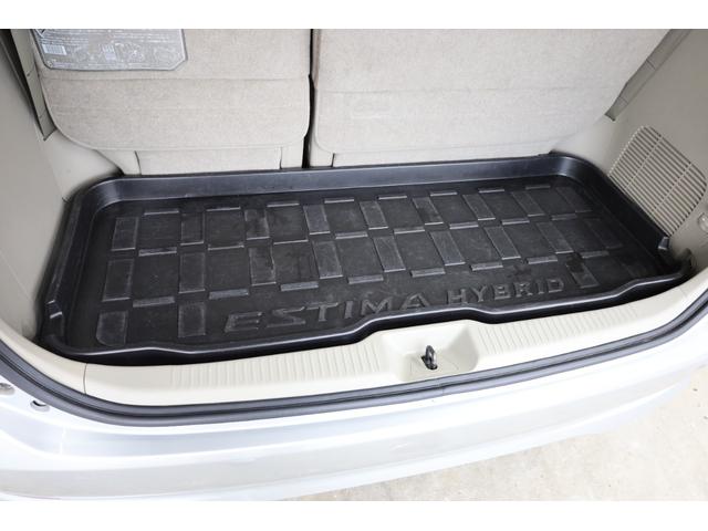 エスティマハイブリッド Gレザーパッケージ 4WD 大型サンルーフ 本革シート 両側電動スライドドア 電動床下格納機能 純正8型ナビ 純正後席モニター 純正17AW 脱着式デッキボード Wエアコン AC1500W オットマン レーダークルーズ(75枚目)