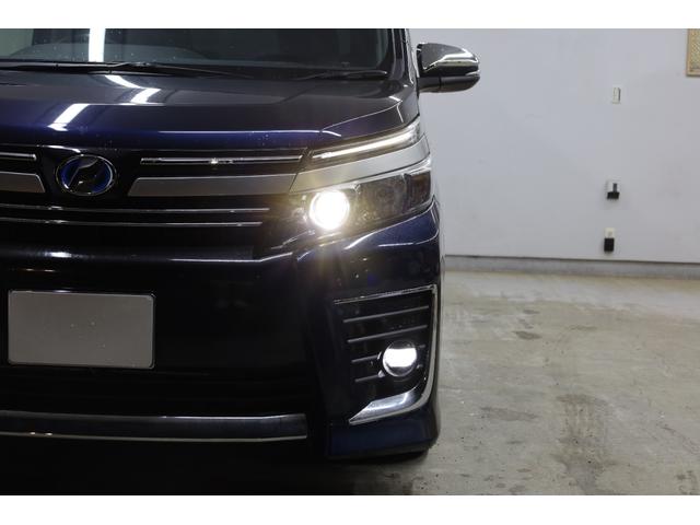 ヴォクシー ハイブリッドZS 煌II ワンオーナー アルパイン10型SDナビ アルパイン12.8型後席モニター Bカメラ 両側電動スライドドア 純正16インチAW 左右独立AAC 後席サンシェード ETC LEDヘッドライト フォグランプ(29枚目)