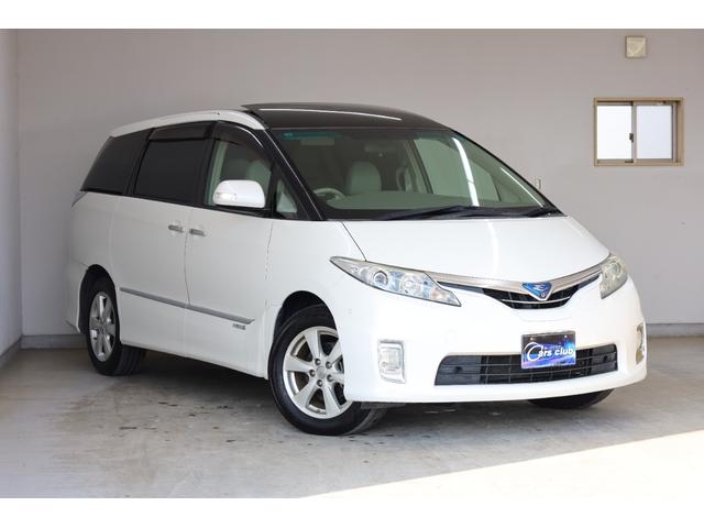 エスティマハイブリッド Ｇレザーパッケージ　４ＷＤ　大型サンルーフ　本革シート　両側電動スライドドア　電動床下格納機能　禁煙　純正８型ＨＤＤナビ　純正後席モニター　純正１７インチＡＷ　Ｗエアコン　ＡＣ１５００Ｗ　オットマン　クルーズコントロール（2枚目）