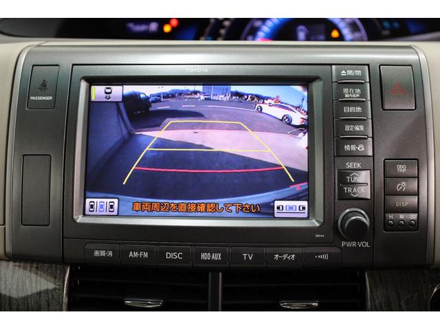 エスティマハイブリッド Ｇレザーパッケージ　４ＷＤ　大型サンルーフ　本革シート　両側電動スライドドア　電動床下格納機能　禁煙　純正８型ＨＤＤナビ　純正後席モニター　純正１７インチＡＷ　Ｗエアコン　ＡＣ１５００Ｗ　オットマン　クルーズコントロール（9枚目）