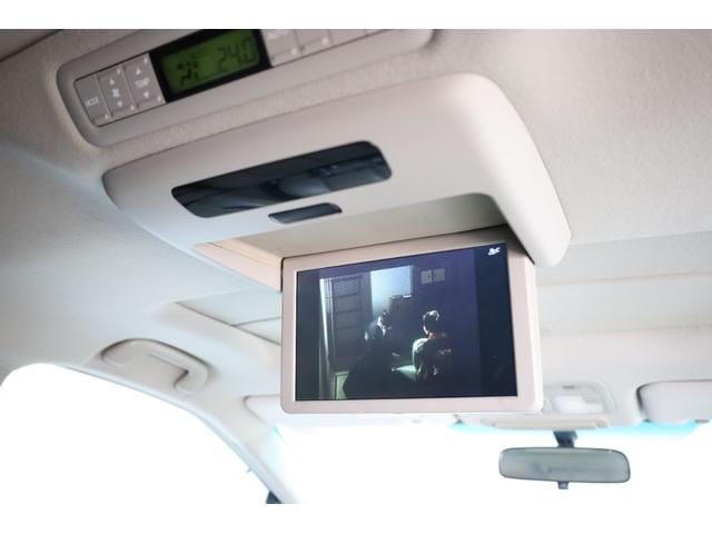 エスティマハイブリッド Ｇレザーパッケージ　４ＷＤ　大型サンルーフ　本革シート　両側電動スライドドア　電動床下格納機能　禁煙　純正８型ＨＤＤナビ　純正後席モニター　純正１７インチＡＷ　Ｗエアコン　ＡＣ１５００Ｗ　オットマン　クルーズコントロール（10枚目）