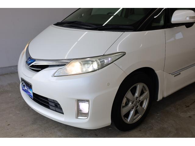 エスティマハイブリッド Ｇレザーパッケージ　４ＷＤ　大型サンルーフ　本革シート　両側電動スライドドア　電動床下格納機能　禁煙　純正８型ＨＤＤナビ　純正後席モニター　純正１７インチＡＷ　Ｗエアコン　ＡＣ１５００Ｗ　オットマン　クルーズコントロール（13枚目）