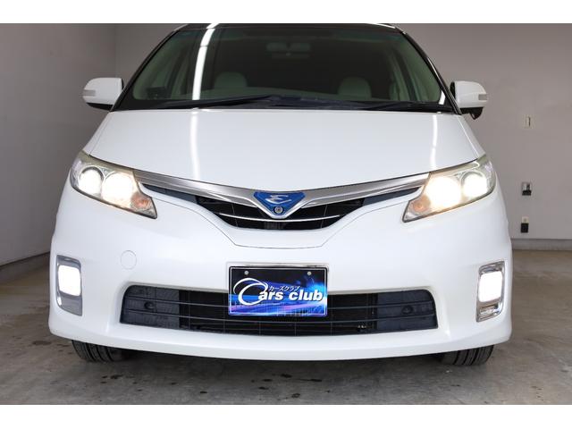 エスティマハイブリッド Ｇレザーパッケージ　４ＷＤ　大型サンルーフ　本革シート　両側電動スライドドア　電動床下格納機能　禁煙　純正８型ＨＤＤナビ　純正後席モニター　純正１７インチＡＷ　Ｗエアコン　ＡＣ１５００Ｗ　オットマン　クルーズコントロール（27枚目）