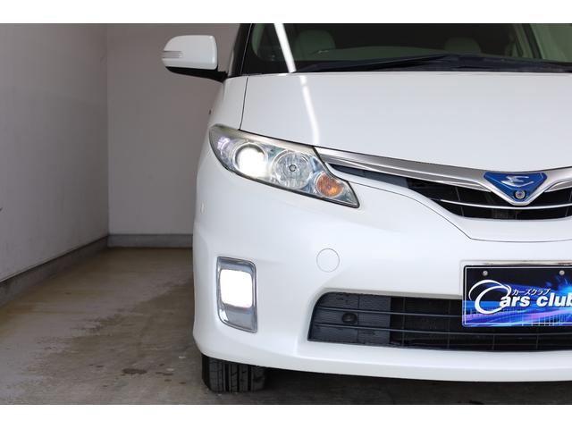 エスティマハイブリッド Ｇレザーパッケージ　４ＷＤ　大型サンルーフ　本革シート　両側電動スライドドア　電動床下格納機能　禁煙　純正８型ＨＤＤナビ　純正後席モニター　純正１７インチＡＷ　Ｗエアコン　ＡＣ１５００Ｗ　オットマン　クルーズコントロール（28枚目）