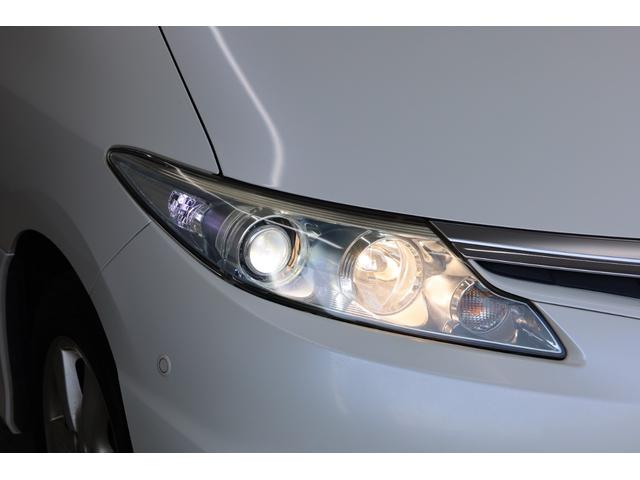 エスティマハイブリッド Ｇレザーパッケージ　４ＷＤ　大型サンルーフ　本革シート　両側電動スライドドア　電動床下格納機能　禁煙　純正８型ＨＤＤナビ　純正後席モニター　純正１７インチＡＷ　Ｗエアコン　ＡＣ１５００Ｗ　オットマン　クルーズコントロール（30枚目）