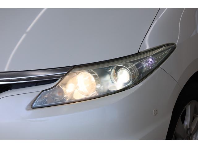 エスティマハイブリッド Ｇレザーパッケージ　４ＷＤ　大型サンルーフ　本革シート　両側電動スライドドア　電動床下格納機能　禁煙　純正８型ＨＤＤナビ　純正後席モニター　純正１７インチＡＷ　Ｗエアコン　ＡＣ１５００Ｗ　オットマン　クルーズコントロール（31枚目）