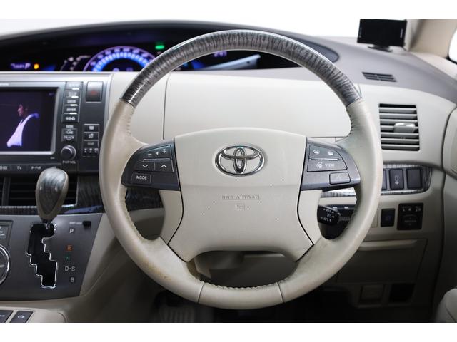 エスティマハイブリッド Ｇレザーパッケージ　４ＷＤ　大型サンルーフ　本革シート　両側電動スライドドア　電動床下格納機能　禁煙　純正８型ＨＤＤナビ　純正後席モニター　純正１７インチＡＷ　Ｗエアコン　ＡＣ１５００Ｗ　オットマン　クルーズコントロール（59枚目）