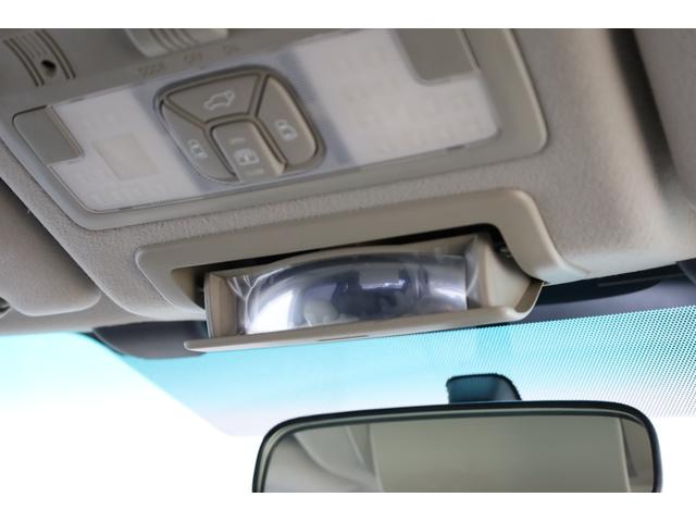 エスティマハイブリッド Ｇレザーパッケージ　４ＷＤ　大型サンルーフ　本革シート　両側電動スライドドア　電動床下格納機能　禁煙　純正８型ＨＤＤナビ　純正後席モニター　純正１７インチＡＷ　Ｗエアコン　ＡＣ１５００Ｗ　オットマン　クルーズコントロール（70枚目）