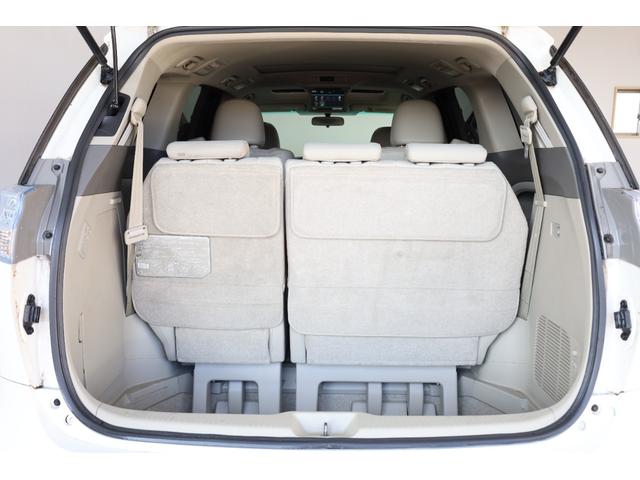 エスティマハイブリッド Ｇレザーパッケージ　４ＷＤ　大型サンルーフ　本革シート　両側電動スライドドア　電動床下格納機能　禁煙　純正８型ＨＤＤナビ　純正後席モニター　純正１７インチＡＷ　Ｗエアコン　ＡＣ１５００Ｗ　オットマン　クルーズコントロール（74枚目）