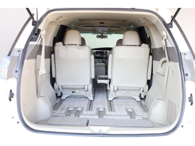 エスティマハイブリッド Ｇレザーパッケージ　４ＷＤ　大型サンルーフ　本革シート　両側電動スライドドア　電動床下格納機能　禁煙　純正８型ＨＤＤナビ　純正後席モニター　純正１７インチＡＷ　Ｗエアコン　ＡＣ１５００Ｗ　オットマン　クルーズコントロール（76枚目）