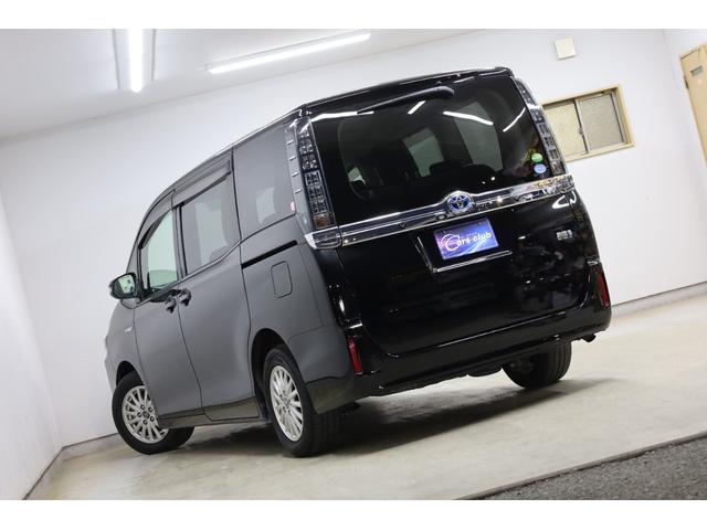 ヴォクシー ハイブリッドＶ　純正１０型ＳＤナビ　純正１２．１型後席モニター　Ｂカメラ　両側電動スライドドア　セーフティセンス　ダブルＡＡＣ　後席サンシェード　シートヒーター　クルコン　純正１５インチＡＷ　ＬＥＤヘッドライト（11枚目）