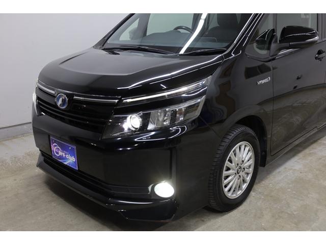 ヴォクシー ハイブリッドＶ　純正１０型ＳＤナビ　純正１２．１型後席モニター　Ｂカメラ　両側電動スライドドア　セーフティセンス　ダブルＡＡＣ　後席サンシェード　シートヒーター　クルコン　純正１５インチＡＷ　ＬＥＤヘッドライト（13枚目）