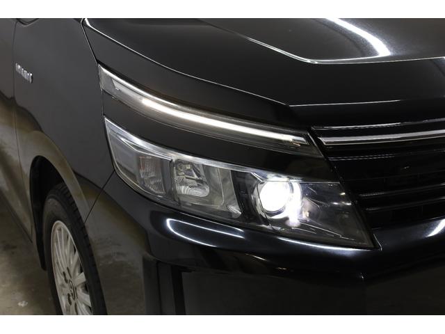 ヴォクシー ハイブリッドＶ　純正１０型ＳＤナビ　純正１２．１型後席モニター　Ｂカメラ　両側電動スライドドア　セーフティセンス　ダブルＡＡＣ　後席サンシェード　シートヒーター　クルコン　純正１５インチＡＷ　ＬＥＤヘッドライト（30枚目）