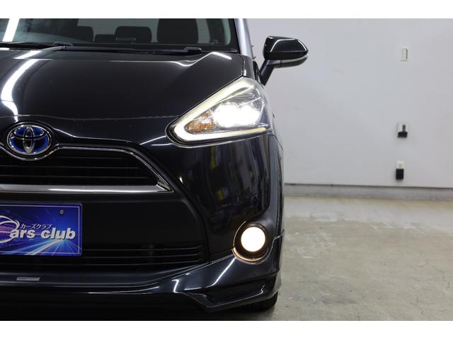 シエンタ ハイブリッドＧ　３列シート　両側電動スライドドア　トヨタセーフティセンス　ＴＲＤフルエアロ　純正１６インチＡＷ　シートヒーター　スマートエントリー　ＬＥＤヘッドライト　ストラーダナビ　ＢＴ接続　Ｂカメラ　禁煙　ＥＴＣ（29枚目）