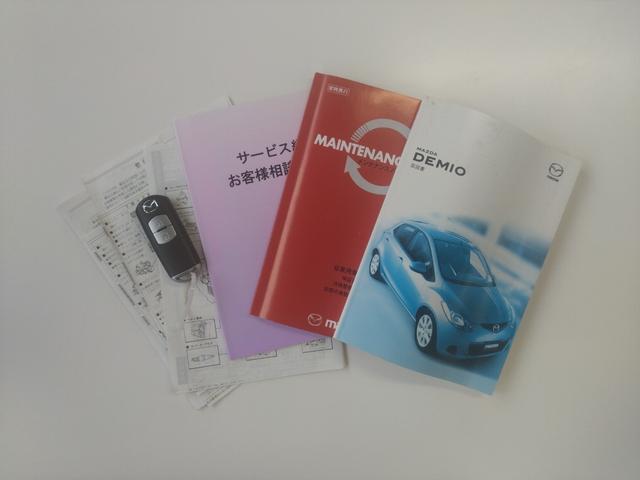 デミオ スポルト　ドライビングコンフォートＰＫＧ　５ＭＴ　純正ナビ　地デジ　ＤＶＤ　ＣＤ　ＥＴＣ　ＨＩＤ　フォグ　オートライト　純正１６インチＡＷ　オートエアコン　Ｗエアバック　ＡＢＳ　スマートキー　走行５４７５０ＫＭ（14枚目）