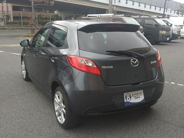 デミオ スポルト　ドライビングコンフォートＰＫＧ　５ＭＴ　純正ナビ　地デジ　ＤＶＤ　ＣＤ　ＥＴＣ　ＨＩＤ　フォグ　オートライト　純正１６インチＡＷ　オートエアコン　Ｗエアバック　ＡＢＳ　スマートキー　走行５４７５０ＫＭ（20枚目）