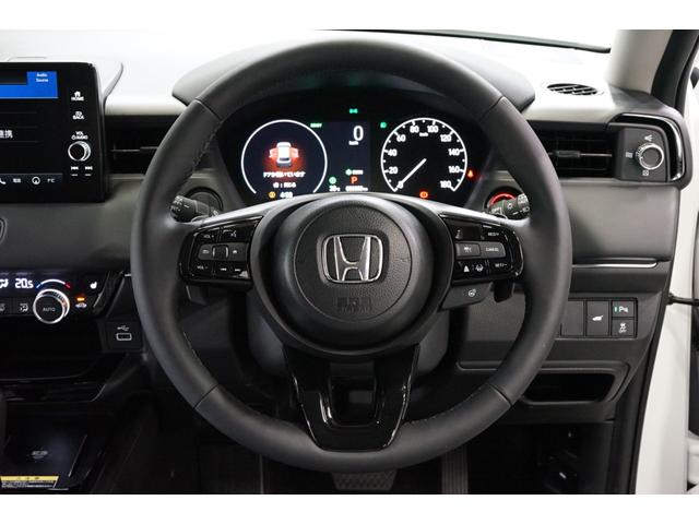 ヴェゼル e:HEV Z ハイブリッド 後期型 登録済未使用車 禁煙車 9型TVナビ バックカメラ ホンダセンシング ETC 衝突軽減ブレーキ CMBS BSM レーダークルーズ ハーフ革 フルセグ Bluetooth接続 パワーバックドア(9枚目)