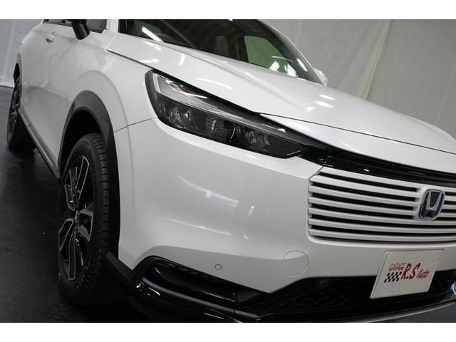 ヴェゼル e:HEV Z ハイブリッド 後期型 登録済未使用車 禁煙車 9型TVナビ バックカメラ ホンダセンシング ETC 衝突軽減ブレーキ CMBS BSM レーダークルーズ ハーフ革 フルセグ Bluetooth接続 パワーバックドア(18枚目)