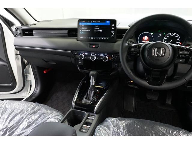 ヴェゼル e:HEV Z ハイブリッド 後期型 登録済未使用車 禁煙車 9型TVナビ バックカメラ ホンダセンシング ETC 衝突軽減ブレーキ CMBS BSM レーダークルーズ ハーフ革 フルセグ Bluetooth接続 パワーバックドア(32枚目)