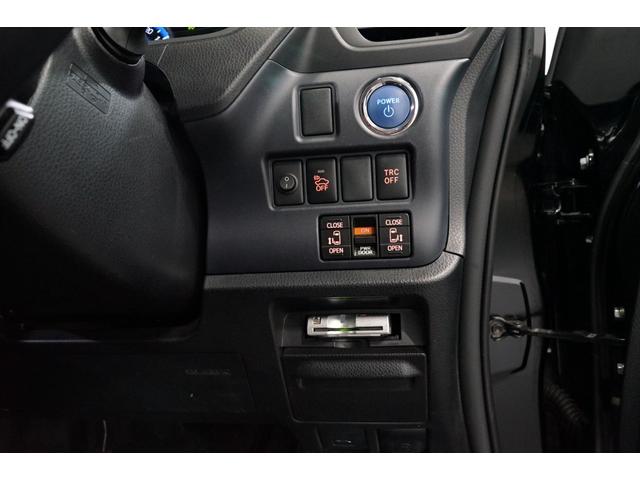 ヴォクシー ハイブリッドV 両側電動スライド モデリスタフルエアロ 9型TVナビ 7人乗り バックカメラ 11型後席モニター オートクルーズ 3列シート ETC スマートキー シートヒーター DVD再生 Bluetooth接続U(12枚目)