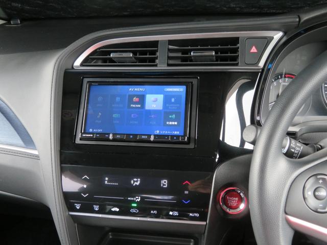 シャトル Ｇ　禁煙車　カロッツェリアナビＴＶ　バックカメラ　アイドリングストップ機能　スマートキー　記録簿　チップアップシート　ＣＤ／ＤＶＤ　Ｂｌｕｅｔｏｏｔｈ接続　ＥＴＣ　フルフラットシート　フルセグ　ステリモＵ（10枚目）