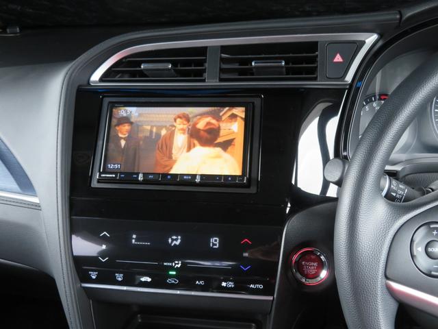 シャトル Ｇ　禁煙車　カロッツェリアナビＴＶ　バックカメラ　アイドリングストップ機能　スマートキー　記録簿　チップアップシート　ＣＤ／ＤＶＤ　Ｂｌｕｅｔｏｏｔｈ接続　ＥＴＣ　フルフラットシート　フルセグ　ステリモＵ（34枚目）