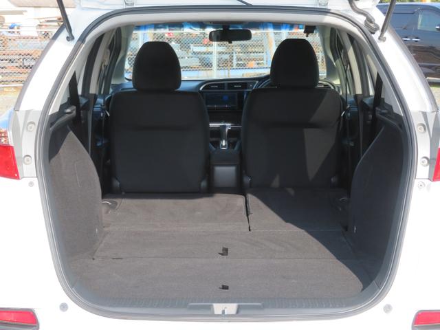 シャトル Ｇ　禁煙車　カロッツェリアナビＴＶ　バックカメラ　アイドリングストップ機能　スマートキー　記録簿　チップアップシート　ＣＤ／ＤＶＤ　Ｂｌｕｅｔｏｏｔｈ接続　ＥＴＣ　フルフラットシート　フルセグ　ステリモＵ（52枚目）