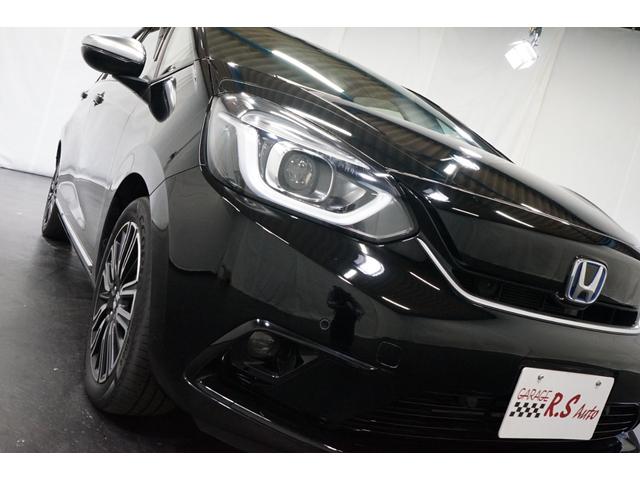 フィット ｅ：ＨＥＶリュクス　禁煙車　ホンダセンシング　Ｇａｔｈｅｒｓ製９インチナビ　バックカメラ　衝突軽減　レーダークルーズ　ハーフレザー　スマートキー　ＥＴＣ　フルセグＴＶ　ＣＤ／ＤＶＤ再生　Ｂｌｕｅｔｏｏｔｈ接続　点検記録簿（18枚目）