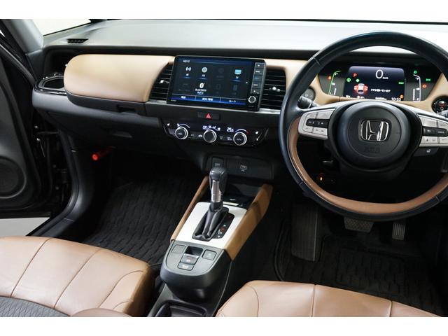 フィット ｅ：ＨＥＶリュクス　禁煙車　ホンダセンシング　Ｇａｔｈｅｒｓ製９インチナビ　バックカメラ　衝突軽減　レーダークルーズ　ハーフレザー　スマートキー　ＥＴＣ　フルセグＴＶ　ＣＤ／ＤＶＤ再生　Ｂｌｕｅｔｏｏｔｈ接続　点検記録簿（32枚目）