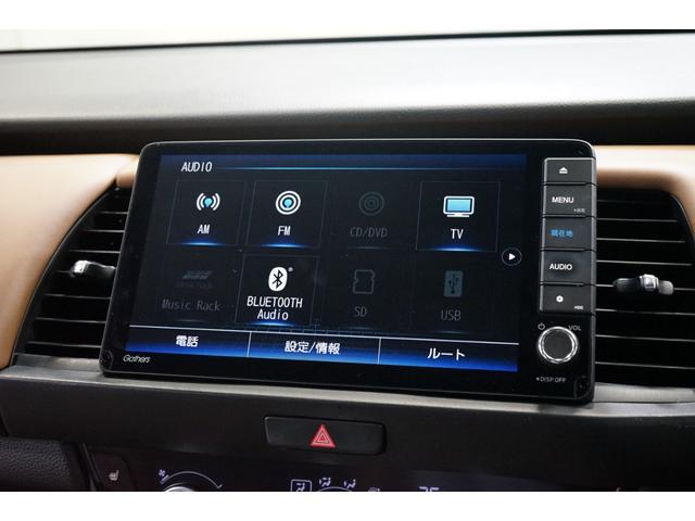 フィット ｅ：ＨＥＶリュクス　禁煙車　ホンダセンシング　Ｇａｔｈｅｒｓ製９インチナビ　バックカメラ　衝突軽減　レーダークルーズ　ハーフレザー　スマートキー　ＥＴＣ　フルセグＴＶ　ＣＤ／ＤＶＤ再生　Ｂｌｕｅｔｏｏｔｈ接続　点検記録簿（35枚目）