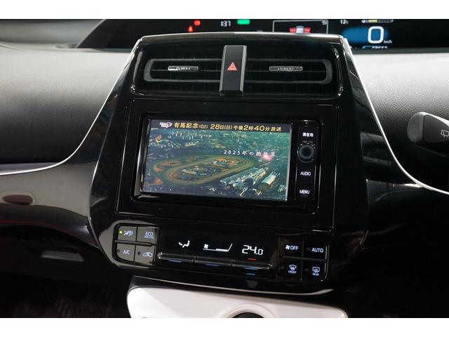 プリウス Sツーリングセレクション 禁煙車 HV車 点検記録簿 黒革シート 7インチナビTV バックカメラ 純正17AW ETC車載器 シートヒーター搭載 CD/DVD再生 Bluetooth接続 アイドリングストップ機能 オートライト(34枚目)