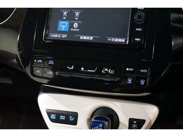 プリウス Sツーリングセレクション 禁煙車 HV車 点検記録簿 黒革シート 7インチナビTV バックカメラ 純正17AW ETC車載器 シートヒーター搭載 CD/DVD再生 Bluetooth接続 アイドリングストップ機能 オートライト(37枚目)
