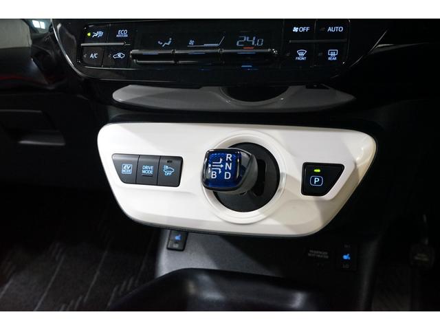 プリウス Sツーリングセレクション 禁煙車 HV車 点検記録簿 黒革シート 7インチナビTV バックカメラ 純正17AW ETC車載器 シートヒーター搭載 CD/DVD再生 Bluetooth接続 アイドリングストップ機能 オートライト(38枚目)